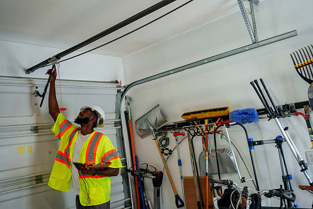 Professional Garage Door Panel Replacement technician working in Winston County County, MS